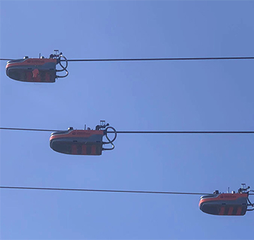 3臺機器人助力上海長興35kV架空裸導(dǎo)線絕緣化改造